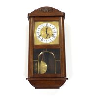 Lot 686 - A German 20th century oak cased wall clock by Kieninger (2)