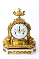 Lot 502 - A Louis XVI gilt bronze mantel clock