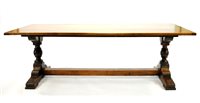 Lot 308 - A stained oak refectory table