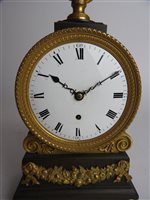 Lot 431 - A late Regency ormolu and bronze library timepiece, circa 1820