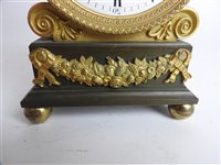 Lot 431 - A late Regency ormolu and bronze library timepiece, circa 1820