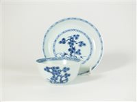 Lot 230 - A Chinese Nanking Cargo blue and white porcelain tea bowl and saucer