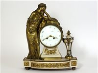 Lot 438 - A Louis XVI ormolu and marble mantel clock