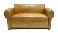 Lot 363 - A 20th century French tanned leather covered folding sofa/day bed
