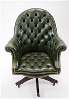 Lot 403 - A reproduction captain's chair