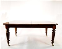Lot 325 - A Victorian mahogany dining table