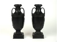 Lot 35 - A pair of Wedgwood black basalt vases