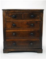 Lot 333 - A early 19th century country oak chest of three long and two short drawers