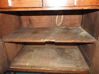 Lot 547 - A Regency oak and ebony strung house keeper’s cupboard