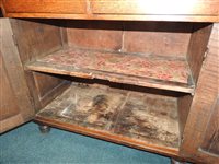 Lot 547 - A Regency oak and ebony strung house keeper’s cupboard
