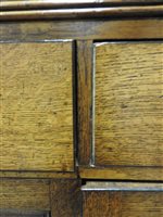 Lot 547 - A Regency oak and ebony strung house keeper’s cupboard