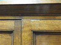 Lot 547 - A Regency oak and ebony strung house keeper’s cupboard
