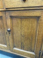 Lot 547 - A Regency oak and ebony strung house keeper’s cupboard