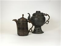 Lot 574 - Two antique eastern copper kettles