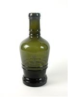 Lot 7 - A large green glass Naval bottle