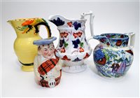 Lot 89 - A collection of jugs
