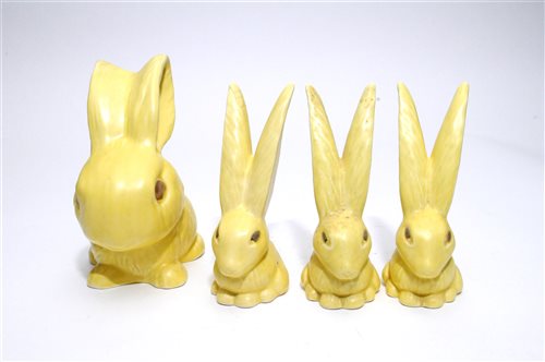 Lot 56 - A rare Sylvac lemon rabbit and three lemon Sylvac hares