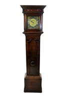 Lot 457 - A George III cottage oak long case clock