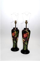 Lot 54 - A pair of Moorcroft Queen's choice lamp bases