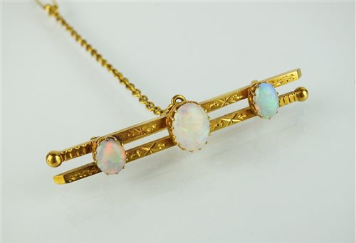 Lot 136 - An opal bar brooch