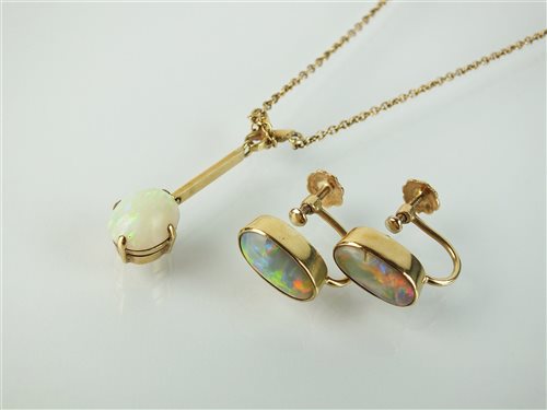 Lot 149 - A pair of opal earrings and a necklace