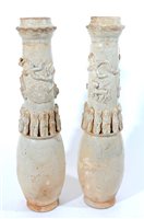 Lot 169 - A pair of Chinese qingbai funerary vases, Song dynasty