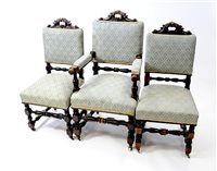 Lot 543 - A set of six (4+2) Victorian oak panel back dining chairs