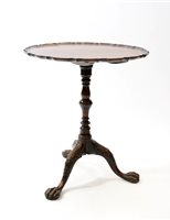 Lot 504 - A George III mahogany tripod table