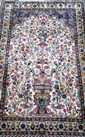 Lot 428 - An Indian prayer rug