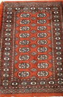Lot 424 - An unusual Turkman prayer rug, a Lahore Bukhara and a Tekke Chuval (3)
