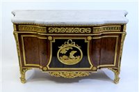 Lot 505 - A French Louis XVI style marble top plum pudding mahogany ebony and ormolu mounted commode