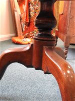 Lot 554 - A late George III mahogany three-tier dumbwaiter