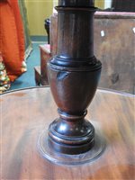Lot 554 - A late George III mahogany three-tier dumbwaiter