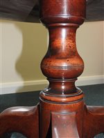 Lot 554 - A late George III mahogany three-tier dumbwaiter