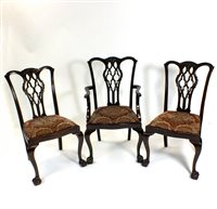 Lot 560 - A set of ten (8+2) mahogany dining chairs in George III style