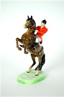 Lot 105 - A pair of Beswick figures of Rearing Huntsmen