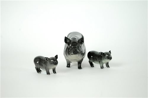 Lot 106 - A family of three Beswick Vietnamese Pot-bellied Pigs