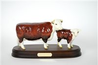 Lot 115 - A Beswick model of Hereford Cow and Calf