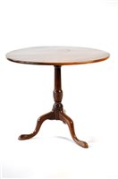 Lot 354 - A mahogany snap top tripod table