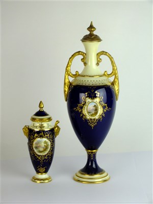 Lot 349 - Two Coalport twin handled landscape vases and covers