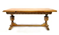 Lot 334 - A large pale oak refectory dining table