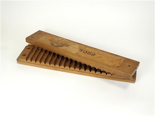 Lot 560 - A 20th century wooden cigar mould/press