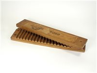 Lot 560 - A 20th century wooden cigar mould/press