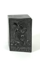 Lot 639 - In interest relating to the abolition of slavery, a cast iron tobacco box