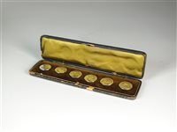 Lot 28 - A cased set of silver Art Nouveau buttons