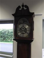 Lot 711 - A George III mahogany longcase clock