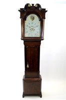 Lot 497 - A George III oak and mahogany cross banded longcase clock.