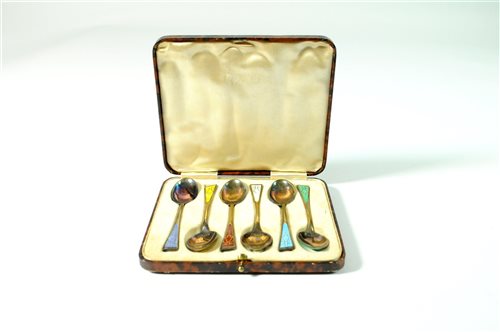 Lot 11 - A set of six silver enamelled spoons