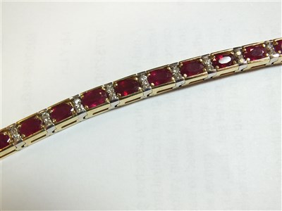 Lot 160 - A ruby and diamond bracelet