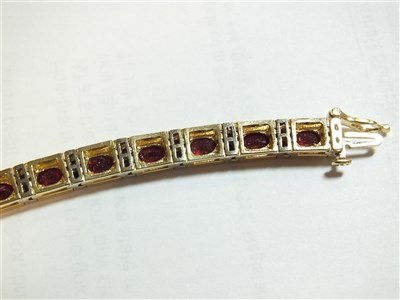Lot 160 - A ruby and diamond bracelet